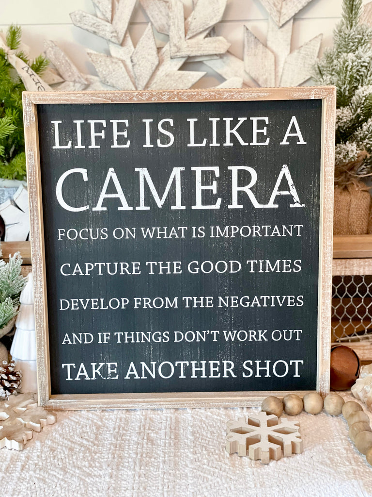 Life is like a camera sign